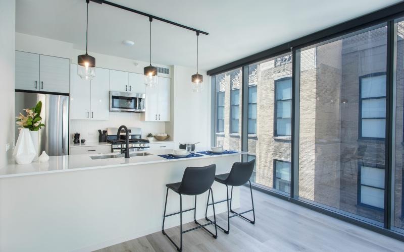 a kitchen with a large window