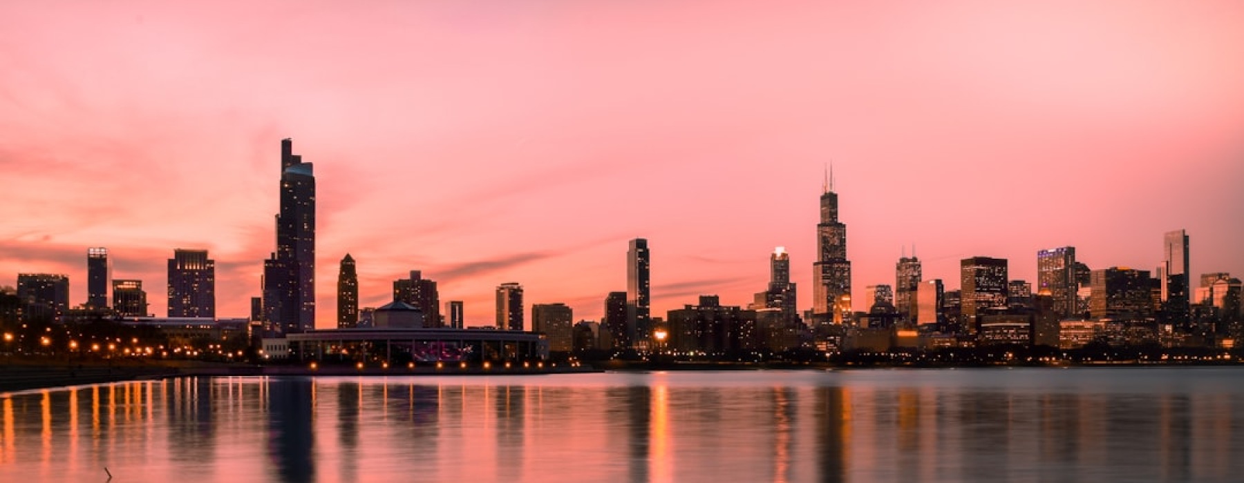Chicago skyline at sunset with high-rise buildings - high rise downtown chicago